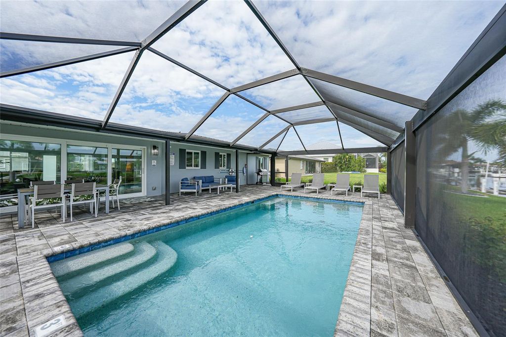 Photo of 440 Capri Isles Court, Punta Gorda, FL 33950 (MLS # C7514713)