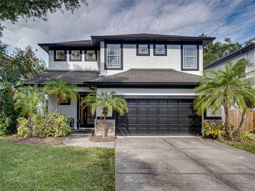 This beautiful South Tampa gem located in Ballast Point features 4 bedrooms, 2.5 baths and 2 car garage. This gorgeous home has everything you could want and more! Upon entering the home, you will love the high ceilings with open space and plenty of natural light.  The newly remodeled kitchen features a quartz island with ample space for seating.  The beautiful cabinets with undercabinet led lighting and quartz counters offer plenty of storage.  The kitchen also has a large walk-in pantry just off the dining room, stainless steel appliances and natural gas stove making this kitchen ideal for preparing meals.  The large open concept kitchen, dining room and living room offers an abundance of room for entertaining and features new luxury vinyl flooring which compliments the space beautifully.  The first-floor bathroom has been completely remodeled and has beautiful tile flooring.  The large, fenced backyard has a pergola with water mist system, 21' x 35' travertine stone patio, built-in firepit, and a dedicated gas line, perfect for expanding the space with an outdoor kitchen and is large enough for a pool.  All bedrooms are located on the second floor have updated engineered hardwood flooring.  The spacious master suite features a beautiful tray ceiling and opens to the stunning upgraded bathroom featuring walk-in shower, freestanding tub, quartz countertop with double sinks and large custom-built 14' x 12' walk-in closet.  The 2nd floor guest bathroom as well as the laundry room have been remodeled. Both AC units have been replaced in 2021 and tankless hot water heater installed in 2020. The home is equipped with many smart features such as light switches, thermostats, sprinkler system, kitchen faucet and stove.  The homes exterior was repainted Oct 2020.  The home's location is ideal, close to MacDill AFB, downtown Tampa, major highways, Tampa International Airport, restaurants, Ballast Point Park & Fishing Pier, The Tampa Yacht Club and A-rated Ballast Point Elementary School.  A short drive to St. Petersburg and beautiful beaches.