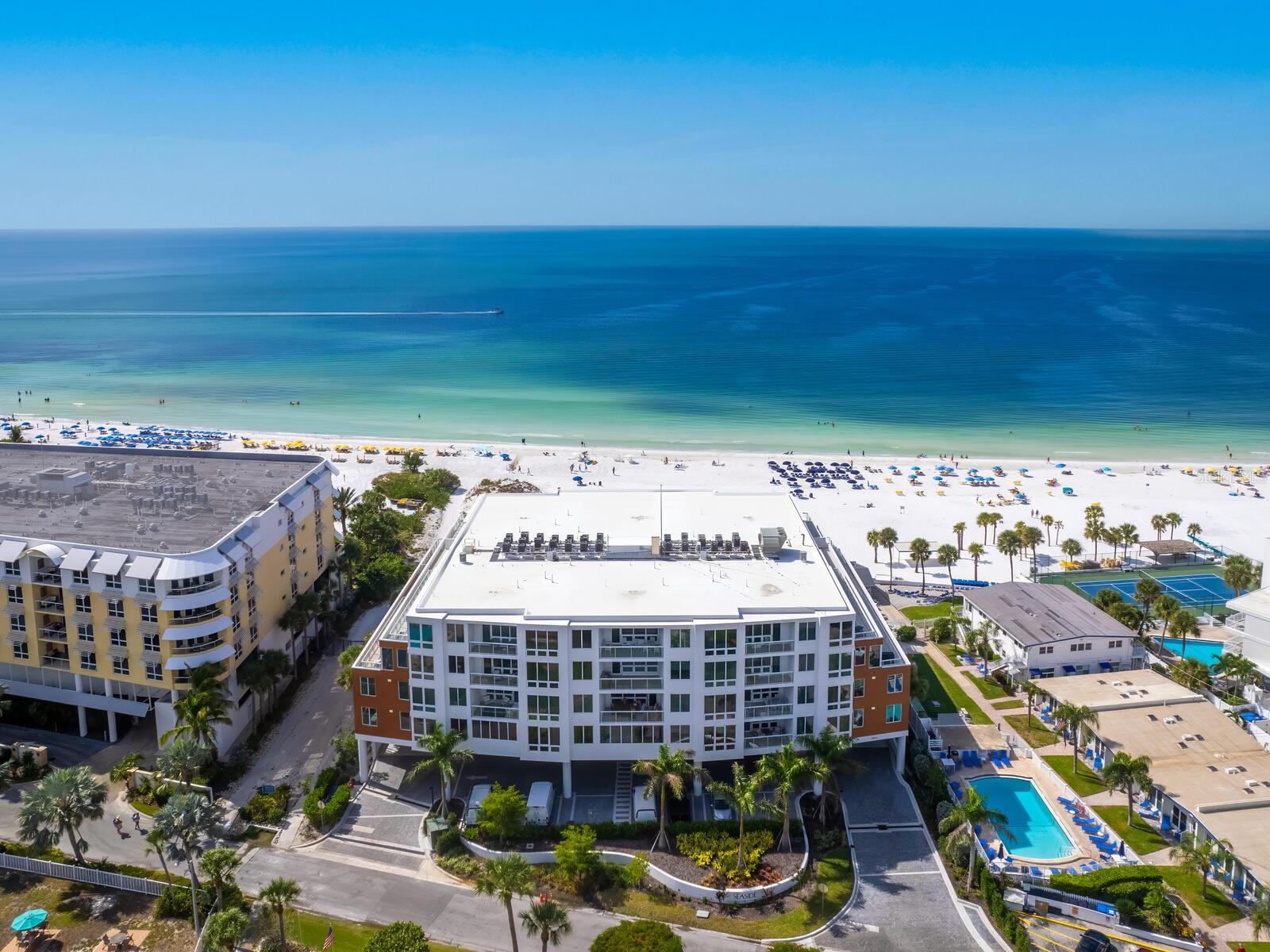 Discover Coastal Luxury at Ten35 Seaside! Welcome to Ten35 Seaside on Siesta Key, where elegance meets the Gulf of Mexico. Unit #305 is a direct Gulf-front retreat offering 3 bedrooms, 3.5 bathrooms, and 2,232 square feet of beautifully designed living space.
This residence is the epitome of modern coastal living, featuring an open-concept floor plan with seamless transitions between spaces. The gourmet kitchen, featuring high-end appliances, seamlessly transitions into the dining and living areas, leading to a 38-foot private terrace with stunning Gulf views. Floor-to-ceiling hurricane-impact windows fill the space with natural light, while automatic shades offer comfort and ease.
The large primary bedroom is a luxurious sanctuary, offering stunning Gulf views, a spacious walk-in closet, and a spa-inspired en suite bathroom with dual vanities and a walk-in shower. This serene retreat is designed to make every day feel like a vacation.
Step onto your private terrace and immerse yourself in the serene beauty of the Gulf, whether enjoying morning coffee, watching vibrant sunsets, or entertaining guests. With private beach access, you can take full advantage of the pristine shoreline, complete with personalized beach service where attendants set up your chairs and umbrellas for ultimate relaxation.
Ten35 Seaside offers an array of luxurious amenities, including on-site property management, fitness center, beachfront pool and spa, grilling stations, fire pit, and private cabanas for your enjoyment. Located on the peaceful south end of Siesta Key, this exceptional property is close to many dining options and gift shops, while Siesta Key Village is just a short drive away.
A piece of Siesta Key paradise awaits you at Ten35 Seaside. Don’t miss the opportunity to make this Gulf-front dream home yours. Schedule your private tour of Unit #305 today!