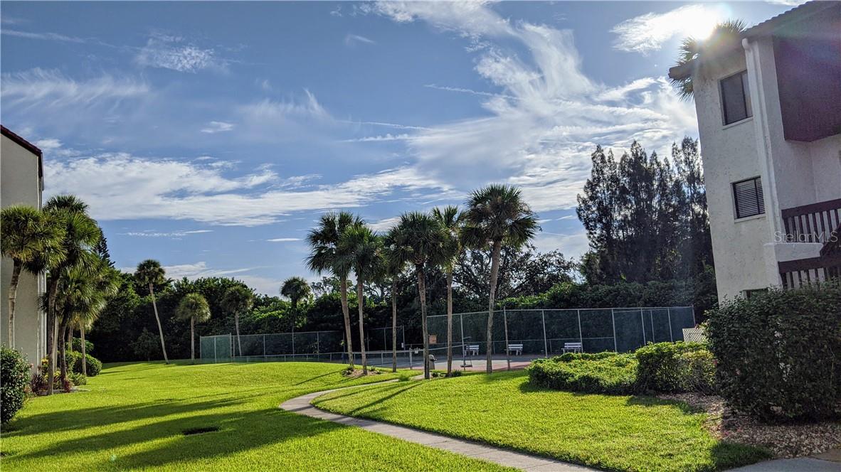 Amazing 2 bedroom 2 bathroom upgraded condo just over the bridge from Siesta Key. One of America's most beautiful beaches known for it's soft sand. All you need is your swimsuit and toothbrush. This complex has lots to offer. Two heated pools, one of witch overlooks Little Sarasota Bay. There you will be able to enjoy watching the boat traffic and yes dolphins! Tennis courts, shuffle board, pickle ball, fishing piers. Hop on the bikes or walk over the bridge. Where you can enjoy the beach, lots of great restaurants, and shops that Siesta is known for. Hurry, this will not last long!