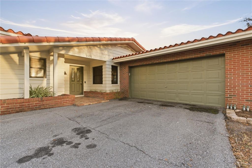 Photo of 1001 Willowbranch Avenue, Clearwater, FL 33764 (MLS # TB8483651)