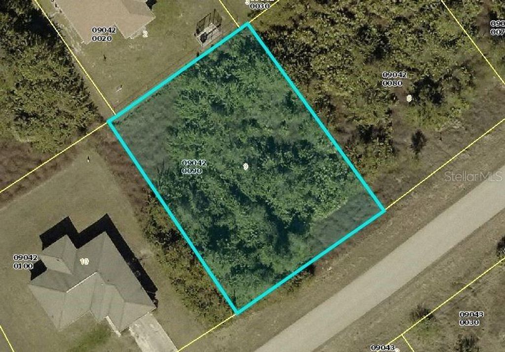 Photo of 307 Partridge Street, Lehigh Acres, FL 33974 (MLS # C7516182)