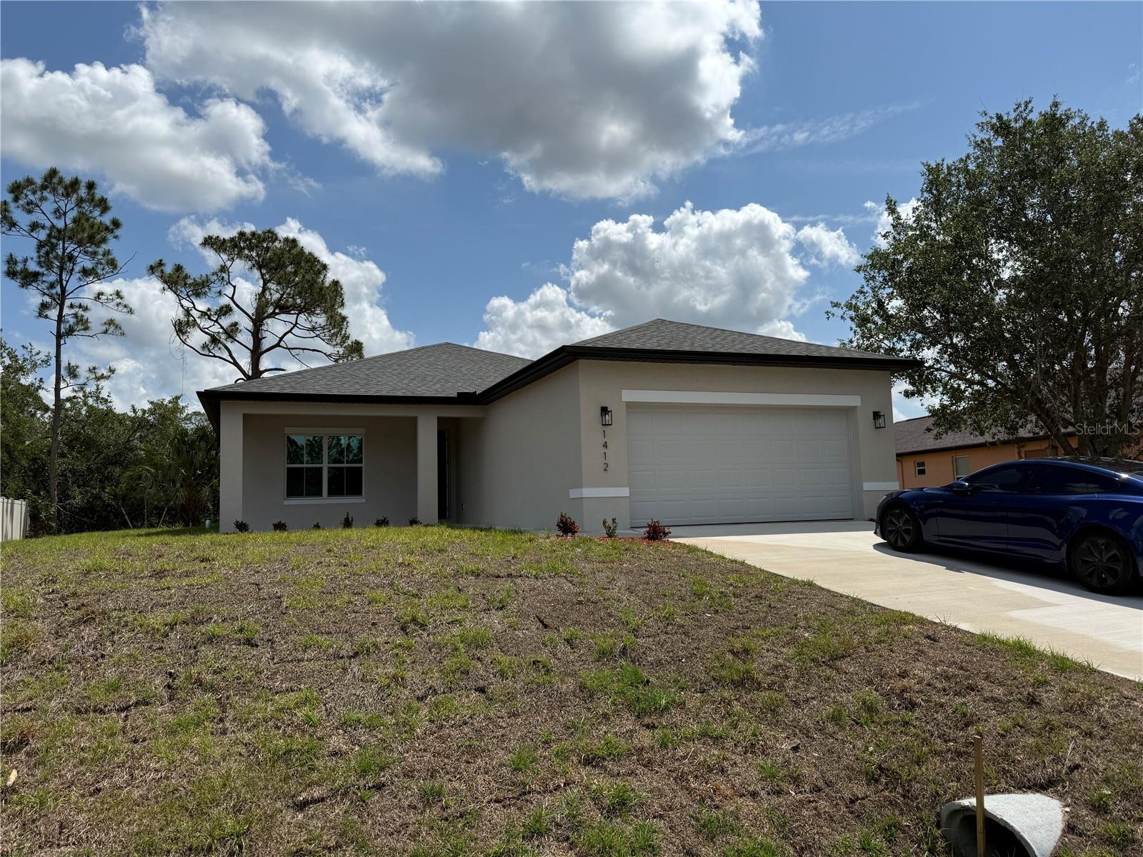 Available immediately for annual rent in North Port, this brand-new home built in 2025 has never been lived in. It features three bedrooms , two bathrooms and nearly 1,650 square feet of living space. The open-concept design includes a spacious kitchen with island, perfect for entertaining. Situated on a 11,469-square-foot lot, the property offers ample outdoor space while being conveniently located near I-75. Additional features include a laundry closet, and a two-car attached garage. Credit and background checks are required. Pets are considered on a case-by-case basis.