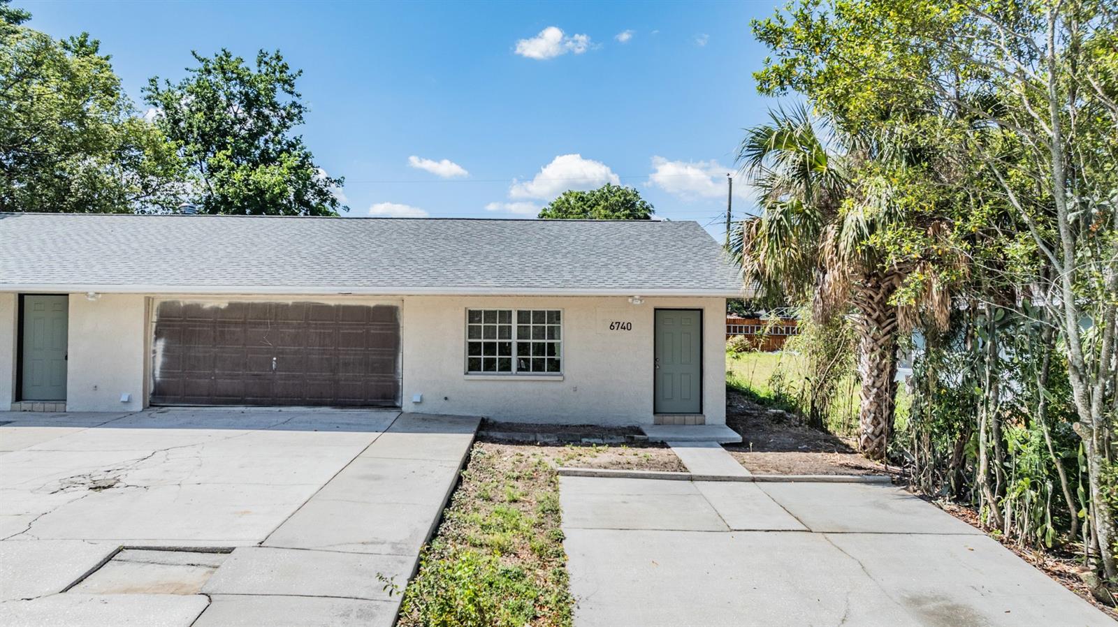 Fully Renovated 1/2 Duplex with plenty of parking and a large backyard!
