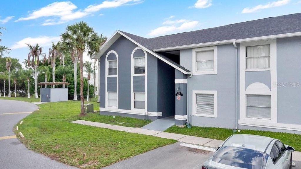 Photo of 4227 Pershing Pointe Place #2, Orlando, FL 32822 (MLS # O6403801)