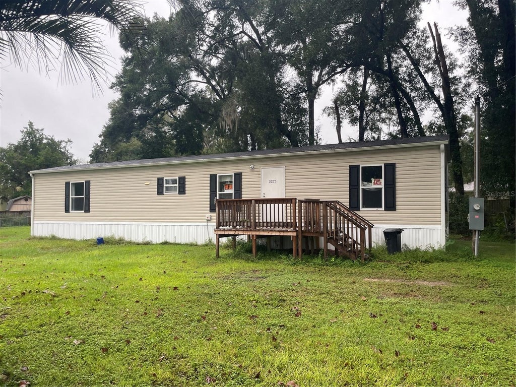 Photo of 3275 SE 133rd Place, Belleview, FL 34420 (MLS # O6448876)
