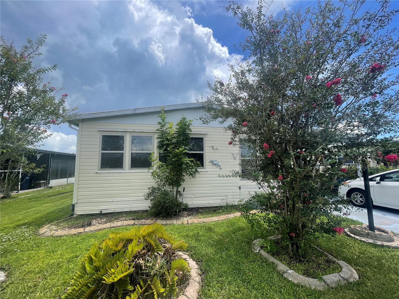 Spacious 2 bedroom/2 bathroom manufactured home located in the lovely Shadow Brook community: pet-friendly, non-age restricted with LOW COA fees that include cable TV, internet, water, sewer trash, and other amenities such as a recreation center and clubhouse with a full kitchen, library, pool table room, heated pool, and shuffleboard courts. Lived-in condition, with signs of age and use throughout from years of building memories. Now ready for a new owner to repair and upgrade with personal touches. Roof is less than 5 years old, HVAC older but functional- may need replacement soon. CASH ONLY- short/zero day inspection period preferred. Home in need of TLC.