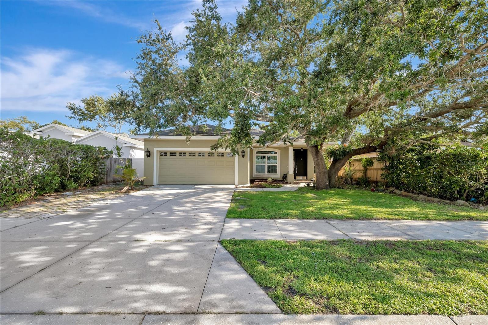 Welcome to this beautiful pool home offering 3 bedrooms, 3.5 bathrooms, and a private 4th bedroom/mother-in-law suite with its own entrance and kitchenette, this property is ideal for multi-generational living, guests, or a home office setup. Boasting over 2,300 sq ft of thoughtfully designed living space, equipped with tall ceilings & wood flooring throughout. The gourmet kitchen boasts granite countertops, stainless GE Profile appliances, and abundant storage, flowing effortlessly into the open living and dining spaces—perfect for entertaining. The primary suite is a luxurious retreat with direct lanai access, a spa-like bathroom complete with a soaking tub, large walk-in shower, and custom walk-in closets. Step outside to your own backyard oasis — a screened in porch with gated pool, built-in stainless BBQ, stone patio, gazebo, and covered lanai with porch swing. It’s the perfect place to relax or host friends year-round. Located in a charming neighborhood within walking distance to A+ schools and just minutes from UTC shopping, downtown Sarasota, and Gulf beaches. This is more than a rental — it’s the Sarasota lifestyle you’ve been looking for. Pets allowed with pet deposit and breed restrictions.