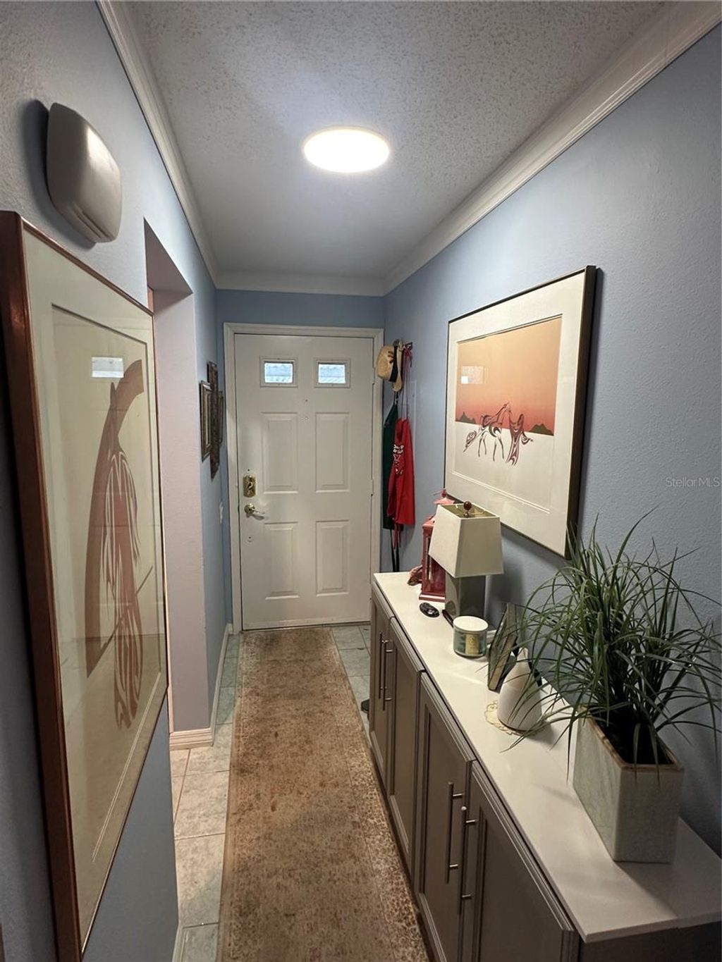 Photo of 2130 Elm Street #401, Dunedin, FL 34698 (MLS # O6393046)