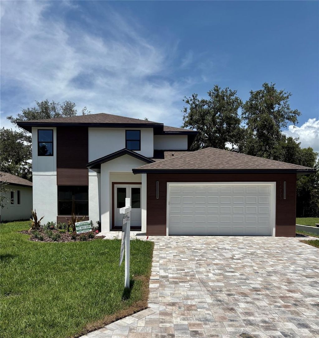 Photo of 14723 Sunset Drive, Largo, FL 33774 (MLS # TB8434350)