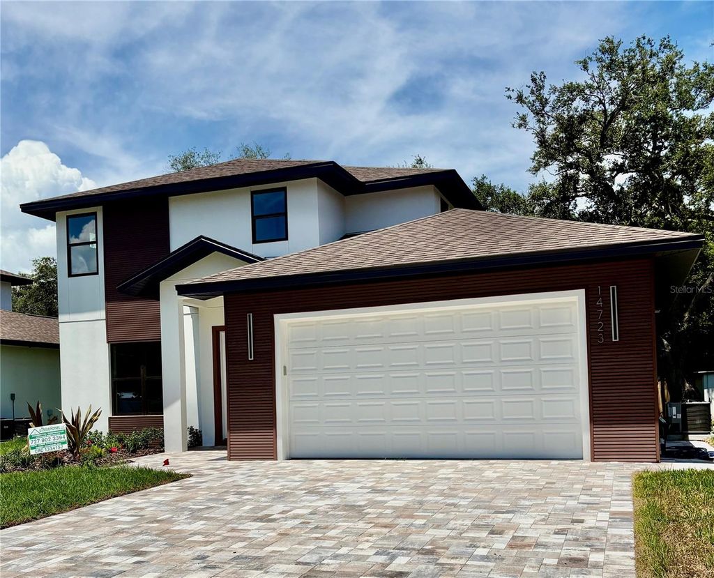 Photo of 14723 Sunset Drive, Largo, FL 33774 (MLS # TB8434350)
