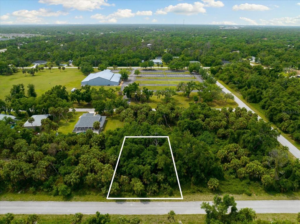 Photo of 397 Kezar Street, Port Charlotte, FL 33954 (MLS # C7499044)