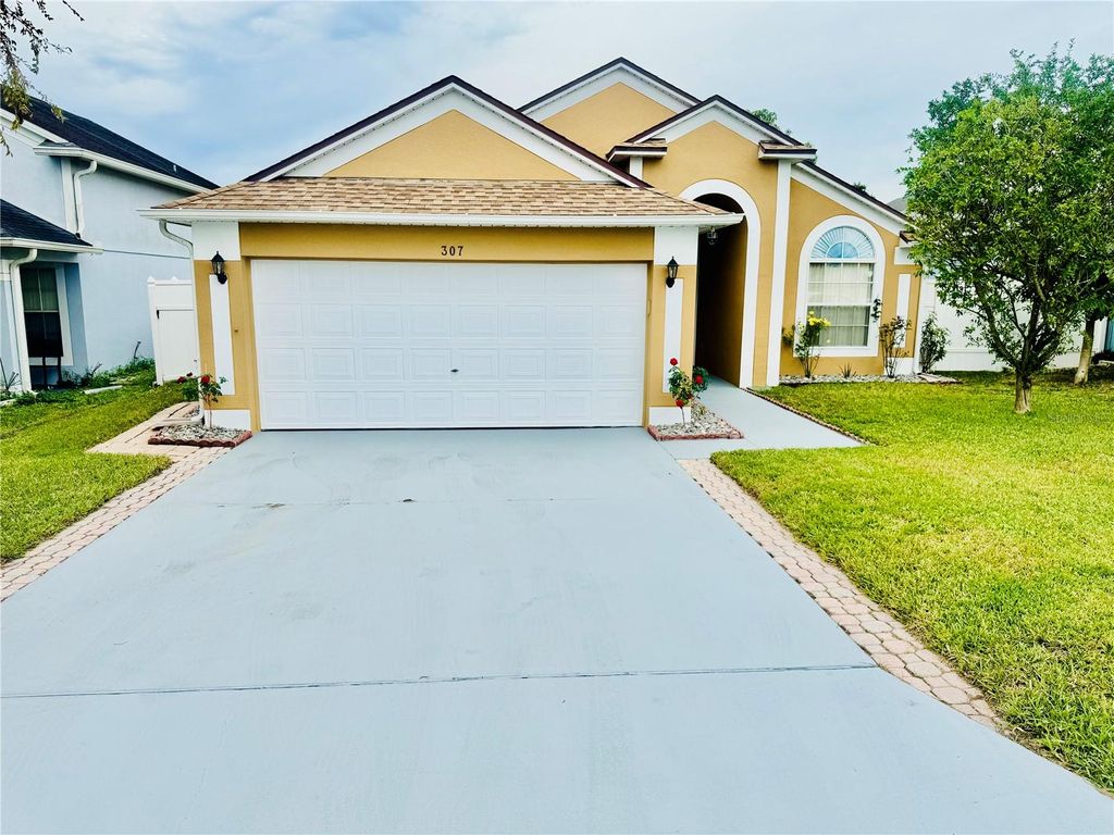 Photo of 307 Nicholson Drive, Davenport, FL 33837 (MLS # S5138086)