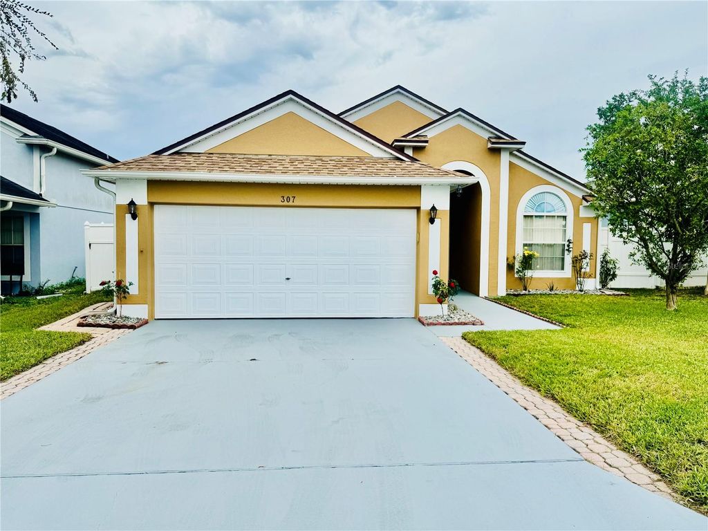 Photo of 307 Nicholson Drive, Davenport, FL 33837 (MLS # S5138086)