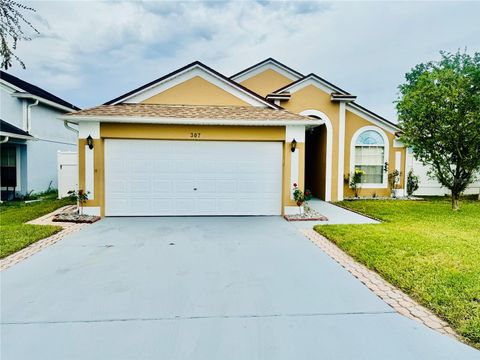 Photo of 307 Nicholson Drive, Davenport, FL 33837 (MLS # S5138086)