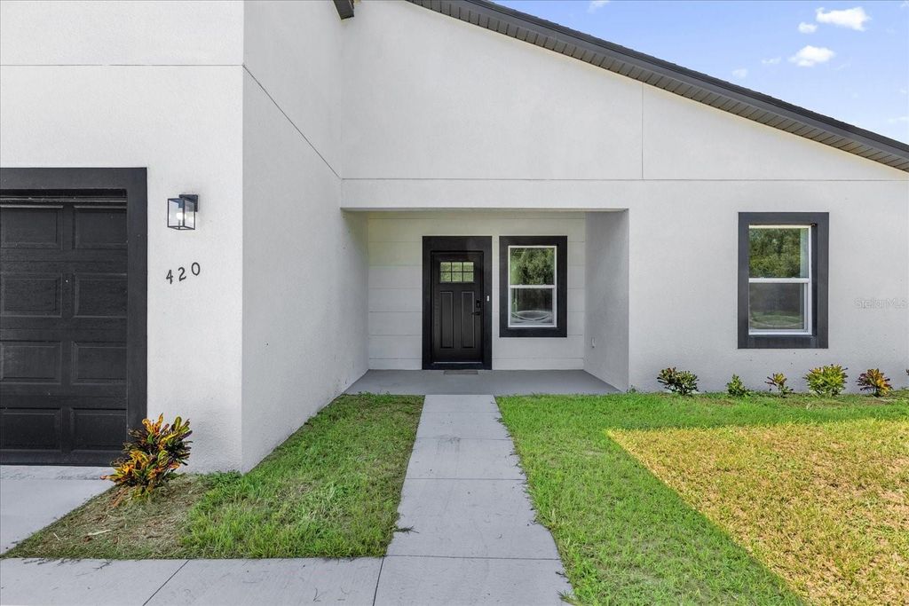 Photo of 420 Marion Oaks Course, Ocala, FL 34473 (MLS # O6365421)