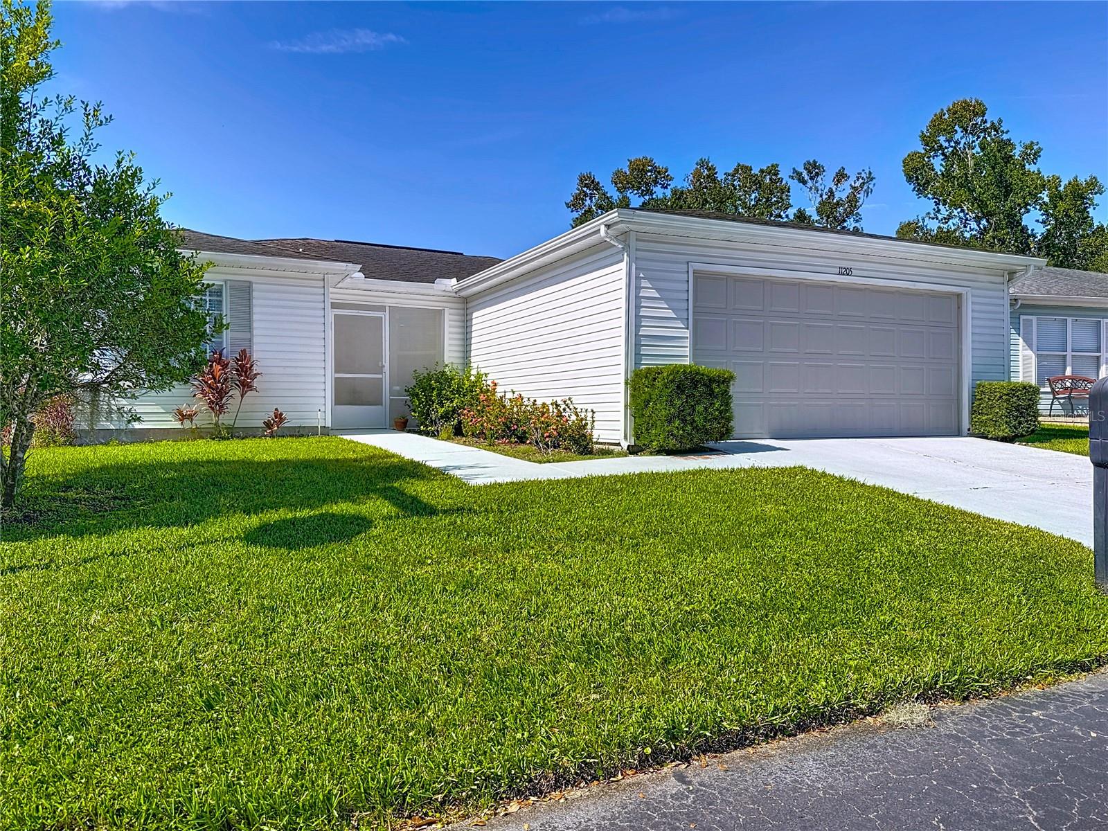 LIGHT, BRIGHT AND OPEN!! This spacious two bedroom + flex space or den office with two full bathrooms, two car garage single family home on a corner homesite is waiting for you in the sought after 55+ Golf community of Tampa Bay Golf and Country Club! Upon approaching the home, you are greeted by a cozy screened in porch, once inside your eye will be drawn to the many windows that allow natural light to pour inside as well as and the soaring ceilings which make the living area feel extra roomy. The kitchen features a sunny eat-in breakfast nook, plenty of cabinet and countertop space along with a breakfast bar overlooking the living area. The generous family room makes the perfect space for entertaining as well as giving you and your guests plenty of room to relax and enjoy company. The master suite is generous in size and features French doors into the adjoining flex space. This area is perfect for a home office, a study, an exercise room or hobby room! The master bathroom offers a walk-in closet, dual sinks with ample counter space, a linen closet and walk in shower! The secondary bedroom is located on the opposite side of the home allowing privacy between bedrooms with a full bathroom conveniently close by. You’ll love the huge indoor laundry room featuring built in cabinets, washer, dryer and laundry tub! Top this off with a whole house water filtration system and reverse osmosis at the kitchen sink! All GE stainless steel appliances included! New garage door motor 2019. New disposal 2019. Seller will install a new roof before closing with an expectable offer, Home also features gutters all around, Front storm door, new tile in all wet areas, new vinyl plank flooring with high base bords in all living area new counter tops in kitchen and both baths, new A/C 2025 and all newer plumbing fixtures thru out. Come enjoy the relaxed active adult lifestyle that Tampa Bay Golf and Country Club provides including a manned, gated entrance, beautifully landscaped community with abundant amenities such as a fitness center, tennis courts, 2 community pools and hot tub, pet parks, shuffleboard and pickle ball courts and community clubhouse! HOA Fee Includes Basic Cable. NO CDD fees! Come see your new home today!