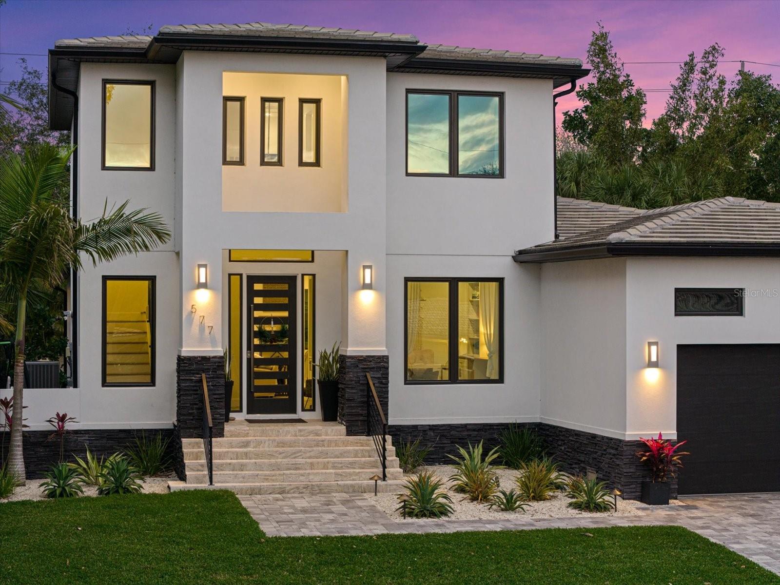 NEW, NEW,NEW… COMPLETED 2021! New Price! Hands down the absolute lowest priced, best value, new construction home on Siesta Key! Why consider spending money on a wet remediated home, or a 40-year-old renovated low ceiling, low lying home with non-impact glass and plumbing and electrical infrastructure issues? Why subject yourself to those older home realities that also come with astronomical maintenance and insurance costs, when you can act NOW by acquiring and investing in a stunning, modern, SAFE, new, West Indies 4 bedroom, 3 1/2 bath masterpiece with all the bells and whistles at a purchase price less than the cost of building new right now, not to mention the hassle of having to wait 2 plus years for completion! The highlights of this home are a two-car garage with a second story 350 sq ft storage area, total parking for 8 cars, an incredible entry area with 20 ft ceilings, an amazing separate office, and a wine room. Other highlights include an inviting heated, saltwater, lush tropical pool area complete with an outdoor kitchen and additional outdoor living spaces on either side of the house. The gorgeous primary suite is downstairs, while upstairs you will find an ensuite guest suite and two additional large bedrooms with a huge jack and jill bath. High and dry during recent storms is an understatement… no water even close to the house or garage. Homeowners insurance including hurricane coverage is only $4000/year and flood insurance is less than $1000/year! In addition, there are currently five new constructions builds on the street nearing completion that will all be listed in the north of $4 million dollar range. VALUE, VALUE, VALUE!