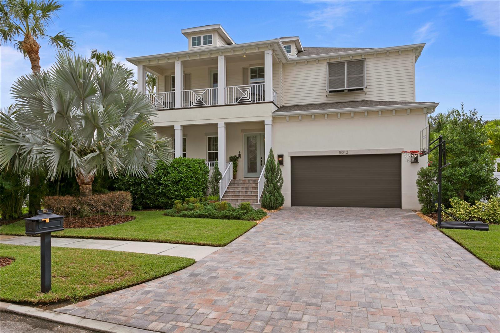 Back on market after the holidays, this Beach Park beauty sits on a quiet street and is built high and dry by New Legacy Homes.
Beach Park beauty on a quiet street and built high and dry by New Legacy Homes. This Energy Star certified home offers superior craftsmanship and quality details throughout. The charming covered front porch welcomes you to the front door. Once inside, the beautiful foyer allows access to a private office with glass French doors and two large windows that bring in natural light. The family room is spacious and has a custom built-in for extra storage and features a wine fridge. The chef's kitchen is open to the family room and boasts a large island, apron sink, SS Fisher & Paykel appliance package (natural gas) including a double drawer dishwasher, pot filler, soft-close custom cabinets, walk-in pantry & LED under cabinet lighting. The family room's French doors flow out to a wonderful entertaining porch with an outdoor kitchen and very Zen and private pool & spa that are completely screened in for lasting enjoyment while outside. Finishing the first level is a guest bedroom with an attached full bath, a separate half bath and a large mudroom with storage where you can drop bags and backpacks when coming in from your garage. The garage has plenty of storage and raised racks to store all your gear and seasonal décor. The 2nd floor offers a large owner’s suite with two amazing master closets, a huge bonus room with a big balcony, two additional bedrooms featuring en-suites and walk-in closets, and a laundry room with a dog washing station. Additional upgrades in the home include: Impact glass, Elan Home Automation system, remote video doorbell, in wall pest tubes, 8 foot interior doors, custom cabinetry, surround sound, Icynene spray foam insulation, 80 SF semi-conditioned attic storage space, and 18 Seer HVAC w/multi zoned control. Backyard was turfed and additional outdoor lighting was added in 2022. This neighborhood has A-rated schools (Plant/Coleman/Grady), is very close to many private schools, minutes to Tampa International Airport and the beaches, and is walking distance to the grocery store, boutiques and many restaurants.Come and see this happy home for yourself!