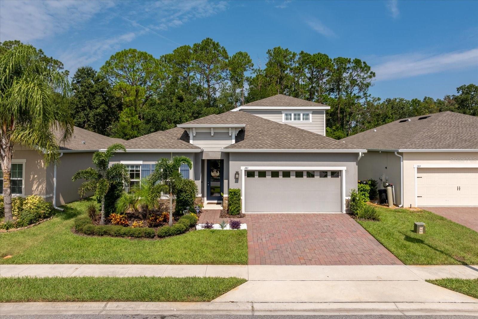 Welcome to this stunning former Ryan Homes Panama floor plan model home with a bonus room and half-bath on the second floor, perfectly situated on a private conservation lot with no rear neighbors! This split-floor plan home offers: Upgraded kitchen with beautiful 42" cabinets & finishes, dual ovens and cooktop ideal for entertaining. Private office with elegant glass French doors. Beautiful and spacious primary suite with luxurious features, en-suite bathroom with dual vanities, shower with bench, separate water closet and spacious walk-in closet. Upstairs you find the versatile bonus room with attached half-bath perfect for guests, movie room and hobby space. A beautifully landscaped backyard awaits you through spacious covered lanai for outdoor enjoyment and relaxation. Community amenities include a resort-style pool, park and dog park. Enjoy the best of Florida living in a prime location close to shopping, dining and world-class attractions, 13 miles from Disney World! There is no CDD in this home community and a 1-year minimum for leasing agreements.