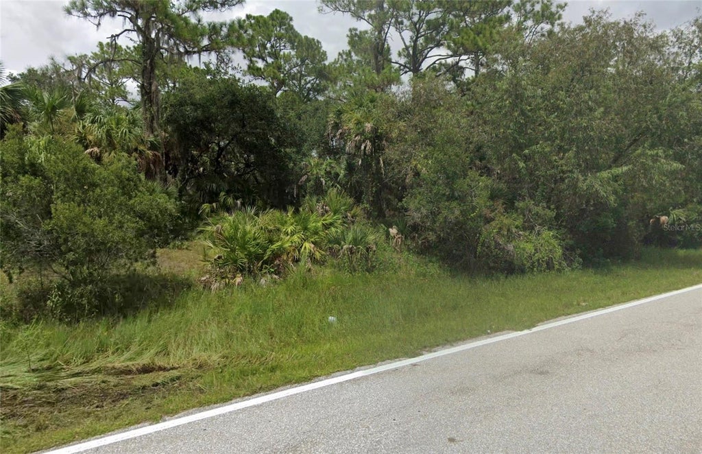 Photo of 14036 Chamberlain Boulevard, Port Charlotte, FL 33953 (MLS # N6145731)