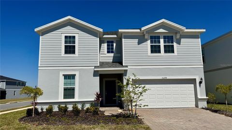 Photo of 16248 Saint Kitts Circle, Clermont, FL 34714 (MLS # O6291441)