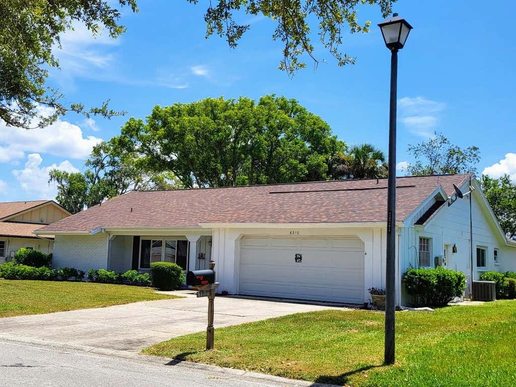 Photo of 8210 Valley Stream Lane, Hudson, FL 34667 (MLS # W7883809)