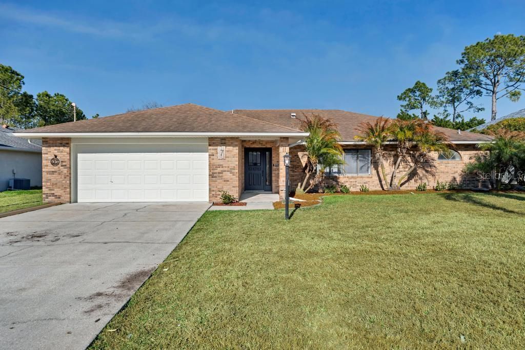 Photo of 7 Bird Land Place, Palm Coast, FL 32137 (MLS # FC315826)