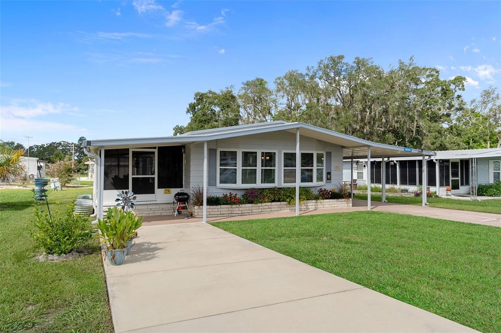 Photo of 8089 Highpoint Boulevard, Brooksville, FL 34613 (MLS # W7889452)