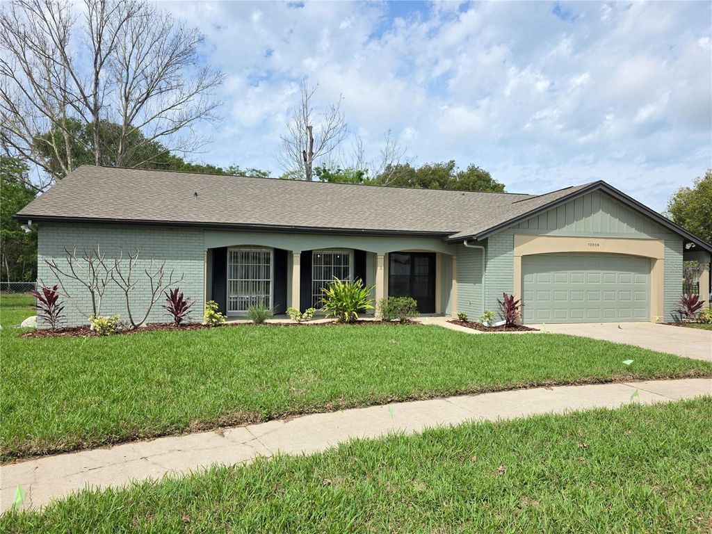 Photo of 13009 Sandburst Lane, Hudson, FL 34667 (MLS # TB8487358)