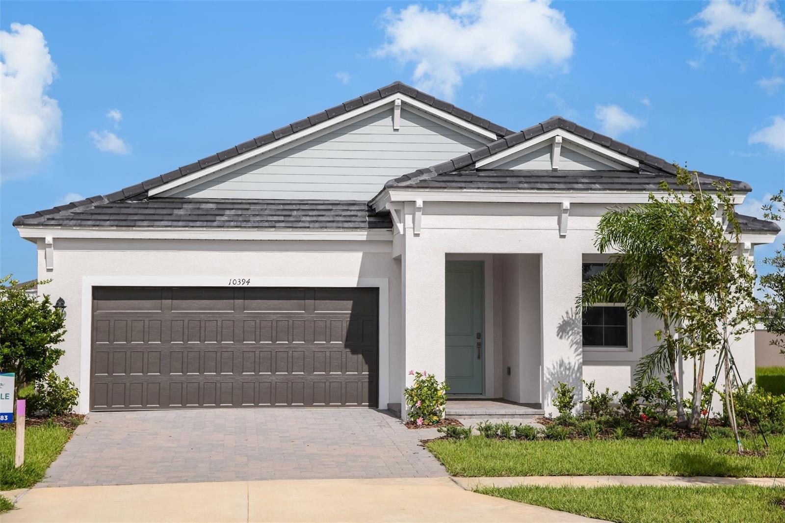 Under Construction. Check out the Calusa, a single-story home where convenience and style go hand in hand! As you step through the bold, eye-catching elevation and professionally designed landscaping, you'll enter an impressive floor plan featuring 4 bedrooms, 2 bathrooms, and a 2-car garage. The first two bedrooms are accessed through the foyer and are connected by a convenient Jack and Jill bathroom. Continue through the extended foyer to discover an additional bedroom, a well-appointed bathroom, and a spacious laundry room with washer and dryer included. Prepare to be impressed by this kitchen, showcasing 42" upper cabinets, quartz countertops, stainless-steel appliances, and a large center island, all set against luxury vinyl plank flooring. The kitchen flows seamlessly into the expansive living room and the formal dining area which opens to the covered lanai through elegant sliding glass doors. The owner's bathroom is a retreat of its own, featuring a walk-in shower with floor to ceiling tile. Equipped with a smart thermostat for seamless climate control and energy efficiency, the Calusa delivers both cutting-edge comfort and outstanding design.
Close to everyday conveniences and top-rated schools. Stay close to what’s important to you at Hawkstone, a Lithia master-planned community. Located just south of FishHawk Boulevard, residents are minutes away from US-301, I-75, and top-rated schools. Surrounded by breathtaking pond and wetland views, Hawkstone delivers the perfect mix of natural beauty and modern amenities right at your doorstep. Whether you're enjoying the serene scenery or the community perks, this is where you'll want to be. Discover your new home at Hawkstone today!
Images shown are for illustrative purposes only and may differ from actual home. Completion date subject to change.