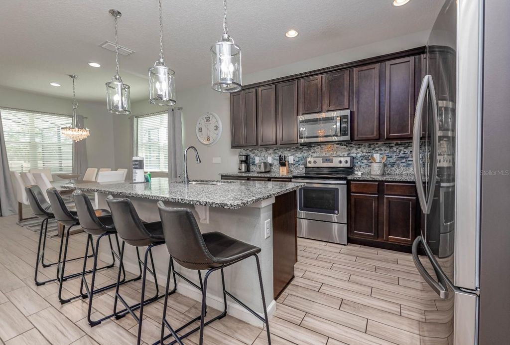 Photo of 2661 Calistoga Ave, Kissimmee, FL 34741 (MLS # O6395610)