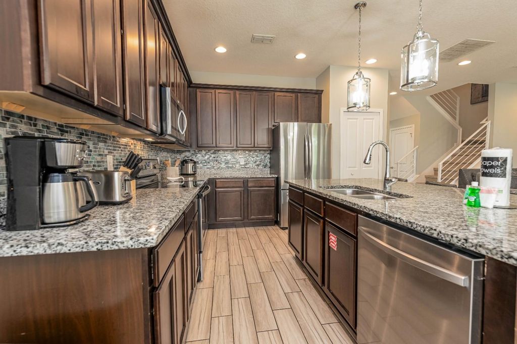 Photo of 2661 Calistoga Ave, Kissimmee, FL 34741 (MLS # O6395610)