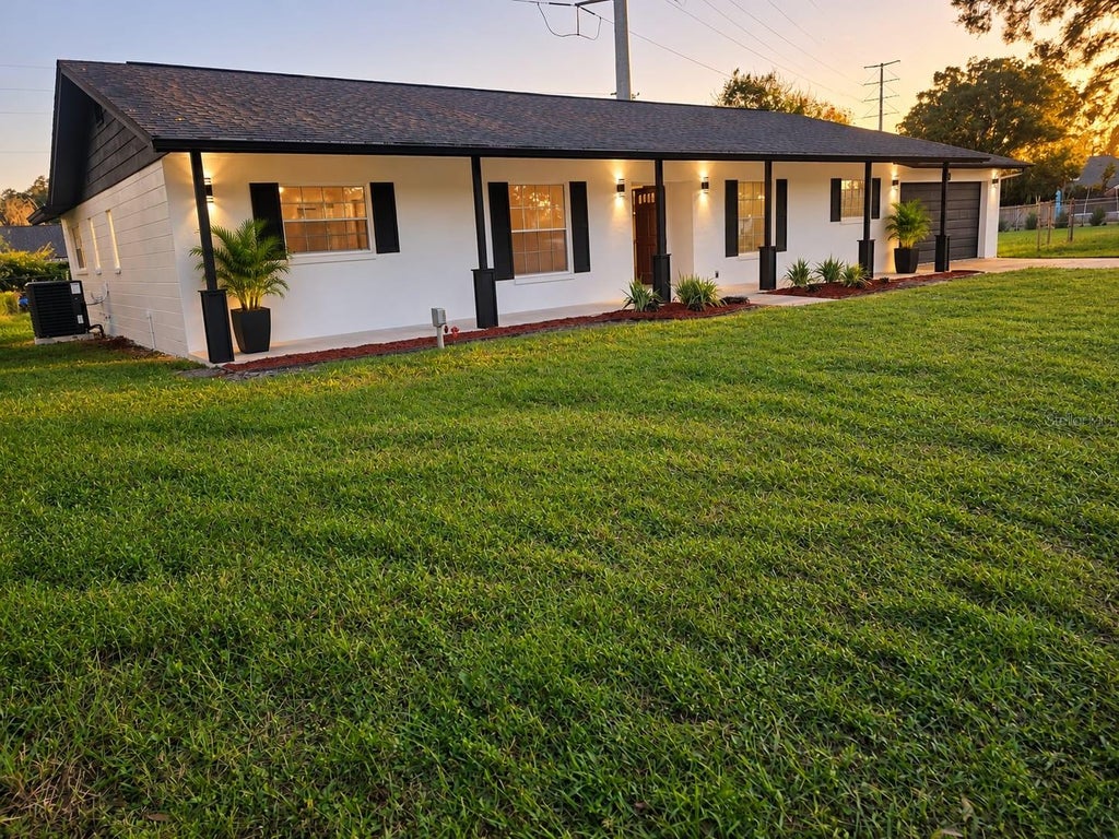 Photo of 22368 Weeks Boulevard, Land O Lakes, FL 34639 (MLS # TB8560264)