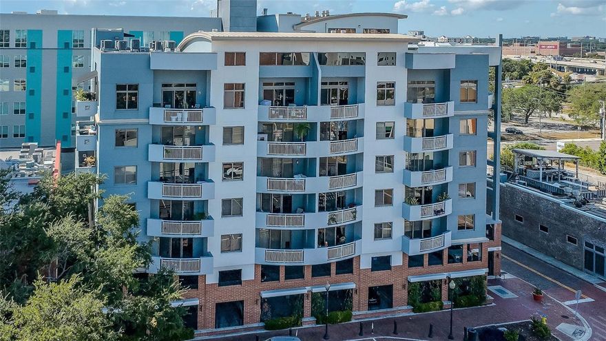 Welcome to The Residences of Franklin Street - considered one of the special gems of downtown Tampa.  Experience contemporary urban living in this beautifully maintained residence with a thoughtful open floor plan and refined finishes throughout. Hardwood bamboo flooring flows through the main living areas, complemented by neutral tones and abundant natural light. The kitchen features granite counters, stainless steel appliances including a French door refrigerator, a Sub-Zero wine fridge with 78-bottle capacity, and a convenient breakfast bar—perfect for casual dining or entertaining.  A sizeable foyer welcomes you into the home, where you will also find a tasteful powder room with a custom vanity and mosaic tile accent wall. The spacious living and dining areas open to a balcony with north and east views, creating an inviting space for gatherings. An office nook and in-unit laundry add to the home’s functionality.  The owners’ suite provides a serene retreat with a private east-facing balcony, blackout window treatments, and an expansive walk-in closet. The primary bath features a marble double vanity, deep soaking tub, a walk-in shower tiled to the ceiling, and a separate WC.  The large secondary bedroom offers an ensuite bath, linen closet, and balcony access.  This gently lived-in home has been lovingly maintained by its original owners. Two premium parking spaces and a storage unit are included.  Residents enjoy a newly renovated lobby, secure building access, and a full suite of amenities: an 8th-floor fitness center, rooftop pool and lounge area, and a welcoming community room with floor-to-ceiling windows and a full kitchen.  Ideally located just a short distance from 3 Michelin-starred restaurants—Rocca, Ebbe, and Kosen—as well as the Arts District, Riverwalk, Straz Center, Tampa Museum of Art, Armature Works and so much more.  Convenient guest parking is available on Franklin St (15-minute limit) and a nearby loading zone on Royal St offers up to one hour of free parking.