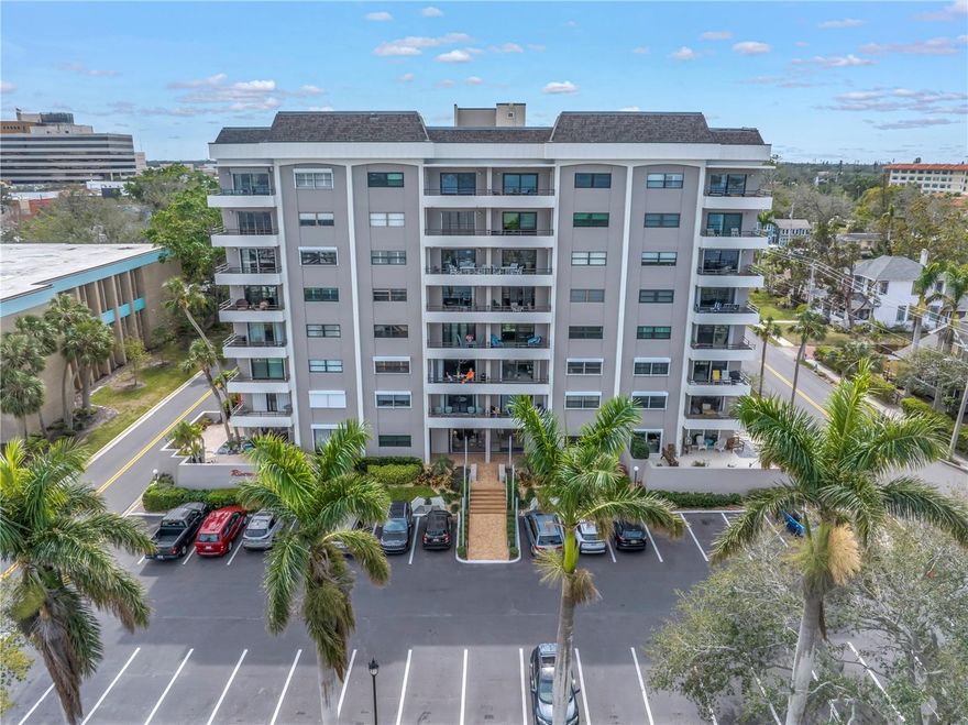 Welcome to RIVERVIEW condo - exactly as described this building is perfectly situated on the Manatee River overlooking the yacht basin in downtown Bradenton. The condo building is elevated and LOCATED OUT OF THE FLOOD ZONE - in ZONE X! Rarely offered, only 1 of 4 units in the building with a private gated large outdoor patio (NEARLY 800 sq ft!) with separate entrance! This first floor unit is perfect for someone desiring outdoor space with the ease of living in a condo. Love to garden? This unit offers multiple planting beds on the patio to customize and enjoy. A foyer entry leads you into the unit where an open living floorplan includes the dining area and living room. Two sets of sliding doors and a wall of windows bring in lots of natural light. The kitchen was renovated in 2019 with white cabinetry, tiled backsplash and appliances. The two bedrooms are separated and both are spacious with walk in closets. An office is tucked into the hallway with built-in desk which can also be converted back to more storage within the unit. The windows in the main bedroom and living area were replaced with hurricane rated Simonton windows. Riverview condo is a 55+ / age restricted building with secure entry, a beautiful community room with a grand piano and gathering room with catering kitchen. The building did not sustain any damage from the 2024 storm season. No flooding, no wind damage nor water intrusion. The unit is being offered furnished, if desired. HVAC replaced 2024. No pets allowed.
