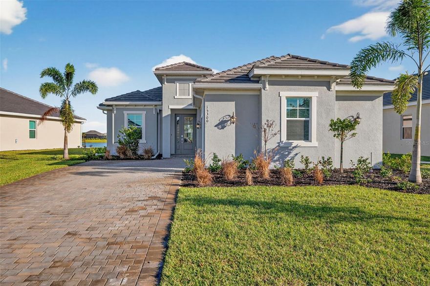 Welcome to 15300 River Birch Ct, Punta Gorda, FL, a never been lived in home! This stunning Victoria model home perfectly blends elegance, functionality, and Florida lifestyle flair! Step inside this 2-bedroom + den, 2.5-bath home and fall in love with its open, airy design and thoughtful details throughout. With 1,850 sq. ft. of living space plus a spacious 365 sq. ft. lanai, this home is designed for effortless entertaining and everyday comfort.The gourmet kitchen will delight any chef — featuring stainless steel appliances, granite countertops, WiFi smart oven, soft-close cabinetry, and a tray ceiling for a touch of sophistication. The dining area, just off the kitchen, also boasts a tray ceiling, creating an inviting space for memorable meals.The great room is open and bright, ideal for gatherings or cozy evenings, while the private den with elegant glass double doors is perfect for a home office or hobby space.Retreat to the luxurious primary suite with a walk-in closet, second closet, private lanai access, and a spa-like bath featuring dual sinks, a soaking tub, and a doorless walk-in shower.Guests will appreciate the privacy of the second bedroom and adjacent full bath located at the front of the home. A convenient half bath off the lanai adds an extra layer of ease when entertaining outdoors.Enjoy peaceful mornings or sunset evenings on the 33’ x 10’ screened lanai, overlooking a beautiful lake view, complete with multiple outlets for TVs and accessories — perfect for outdoor living and entertaining.The epoxy-finished 2-car courtyard garage adds curb appeal and function, while the laundry room comes fully equipped with a washer and dryer for your convenience.Located in the Heritage Landing Golf & Country Club, this home offers access to resort-style amenities including a championship golf course, pickleball and tennis courts, fitness center, pool, spa, clubhouse dining, and more!Heritage landing is a gated, amenity-rich community with a championship Gordon Lewis golf course, 3 on-site restaurants, tennis & pickleball, a state-of-the-art fitness center with sauna, resort-style pool, vibrant social calendar. Minutes to Punta Gorda's waterfront & historic district, marinas, parks dining, and I-75. Welcome home! Note: Lot size is estimated.