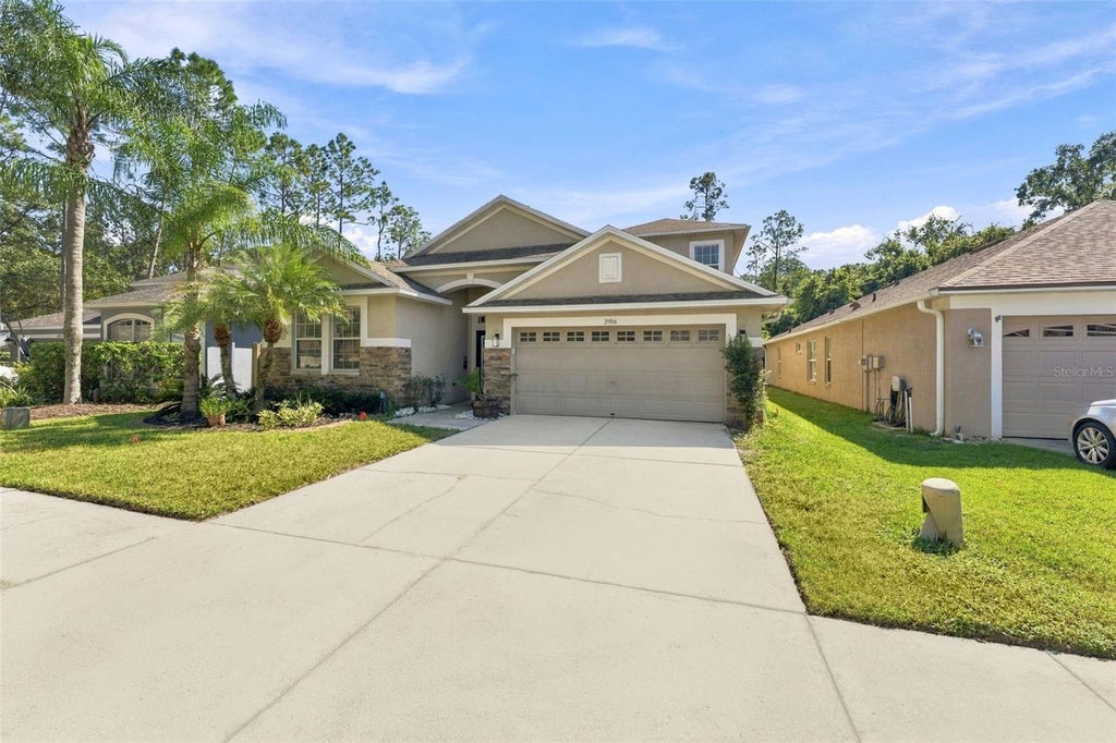 Photo of 21916 Waverly Shores Lane, Land O Lakes, FL 34637 (MLS # TB8557795)