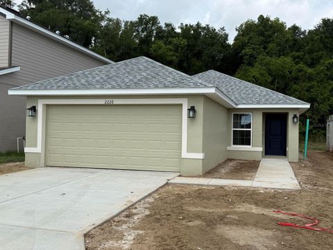 Photo of 2226 NW 23rd Loop, Ocala, FL 34475 (MLS # OM722312)