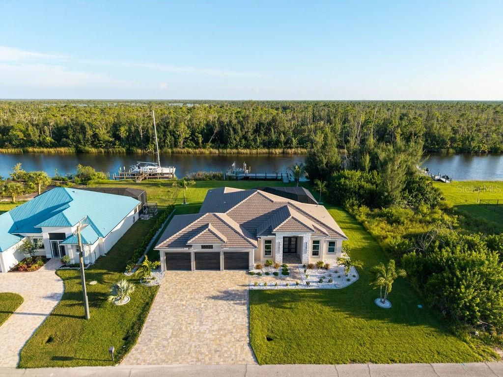 Photo of 16622 Liggett Circle, Port Charlotte, FL 33981 (MLS # A4663962)