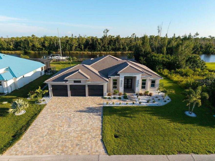 Are you looking for perfect blend of modern luxury, timeless design, and the natural beauty of Florida’s waterfront lifestyle. From the moment you arrive, The expansive open-concept layout features soaring ceilings and huge fully retractable sliding doors that fill the living spaces with natural light, creating a warm and inviting atmosphere. At the heart of the home lies the chef’s kitchen, complete with high-end appliances, dolomite countertops, and custom cabinetry—perfect for both everyday living and entertaining. The owner’s suite is a true retreat, offering a spa-inspired bathroom and an oversized walk-in closet, while two private guest suites with en-suite baths ensure family and visitors feel right at home and have been thoughtfully designed to provide both comfort and style. 

Step outside and experience the very best of Florida living. A screened-in pool and spa create a private oasis, framed by modern paver decking. The crown jewel of the outdoor living space is the expansive cabana, thoughtfully designed for entertaining on any scale. Outfitted with two beverage refrigerators, a Coyote pellet grill, and a sleek built-in sink, it combines functionality with high-end style. Generous counter space and custom finishes make meal prep effortless, while the layout provides comfortable seating for up to ten guests. Whether hosting sunset dinners poolside or casual weekend gatherings, this cabana transforms every occasion into an unforgettable Florida experience. Whether you’re hosting gatherings or enjoying quiet evenings, this space is designed to make the most of the year-round sunshine. The property backs up to a lush preserve and a brackish canal, offering both privacy and a beautiful natural backdrop.

For boating enthusiasts, the home includes a private dock that stretches the width of the property and a boat with a 13,000 lbs capacity, making it easy to enjoy the water at a moment’s notice. From peaceful canal views to the convenience of quick access to open waters, this property is a haven for those who love the coastal lifestyle.

Blending solid construction, elegant finishes, and thoughtfully designed spaces, this home is more than just a residence—it’s a lifestyle. Located just minutes from pristine Gulf beaches, championship golf courses, fine dining, and shopping, it offers everything you need to enjoy the best of Southwest Florida living.
