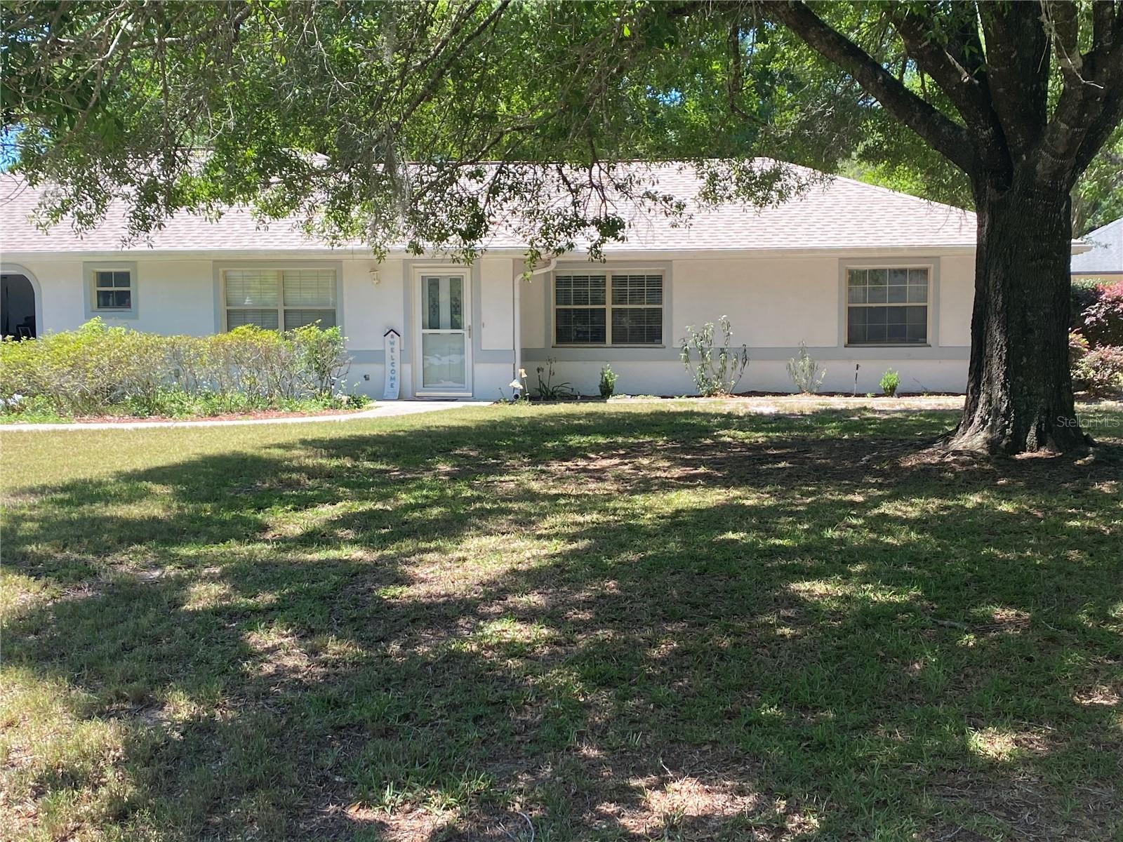LOCATION, LOCATION, LOCATION and welcome to your home in Rainbow Springs. This amazing home is in one the mostsought-after communities in Marion County Florida. Rainbow Springs is a Private Deed Restricted community in Dunnellon Florida home to the Famous Rainbow springs and River system. This tropical paradise is unique and is a one of a kind Tourist Destination. Tourist from all over the world flock to this location to enjoy the Crystal-Clear Spring Water and River system. This property features updated 3 Bedrooms 2 Bathrooms with a Florida Room and a patio area. The layout is spacious with new tile plank floors, remodeled bathrooms, interior freshly painted and convenient inside laundry room located off the garage and a roof which was installed approxiamely 6 years ago. As a resident you'll have access to the community's private beach on the Rainbow River along with amenities like a pool, tennis courts, pickleball, basketball clubhouse and restaurant. This home is move in ready and is a must see with the best of Florida living. Schedule your viewing today!