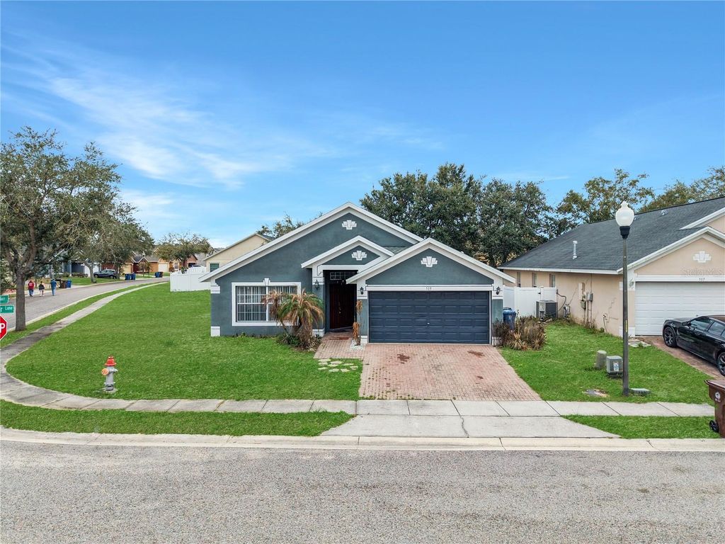 Photo of 519 Winthrop Place, Haines City, FL 33844 (MLS # P4938028)