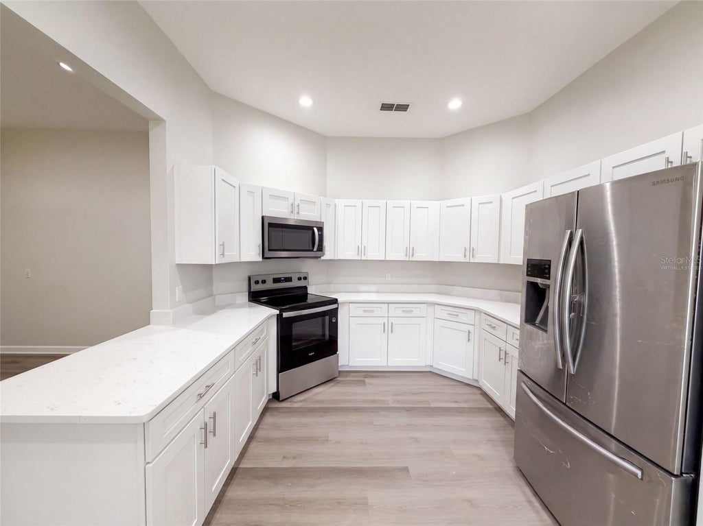 Photo of 24 Bay Pointe Drive, Ormond Beach, FL 32174 (MLS # O6435772)