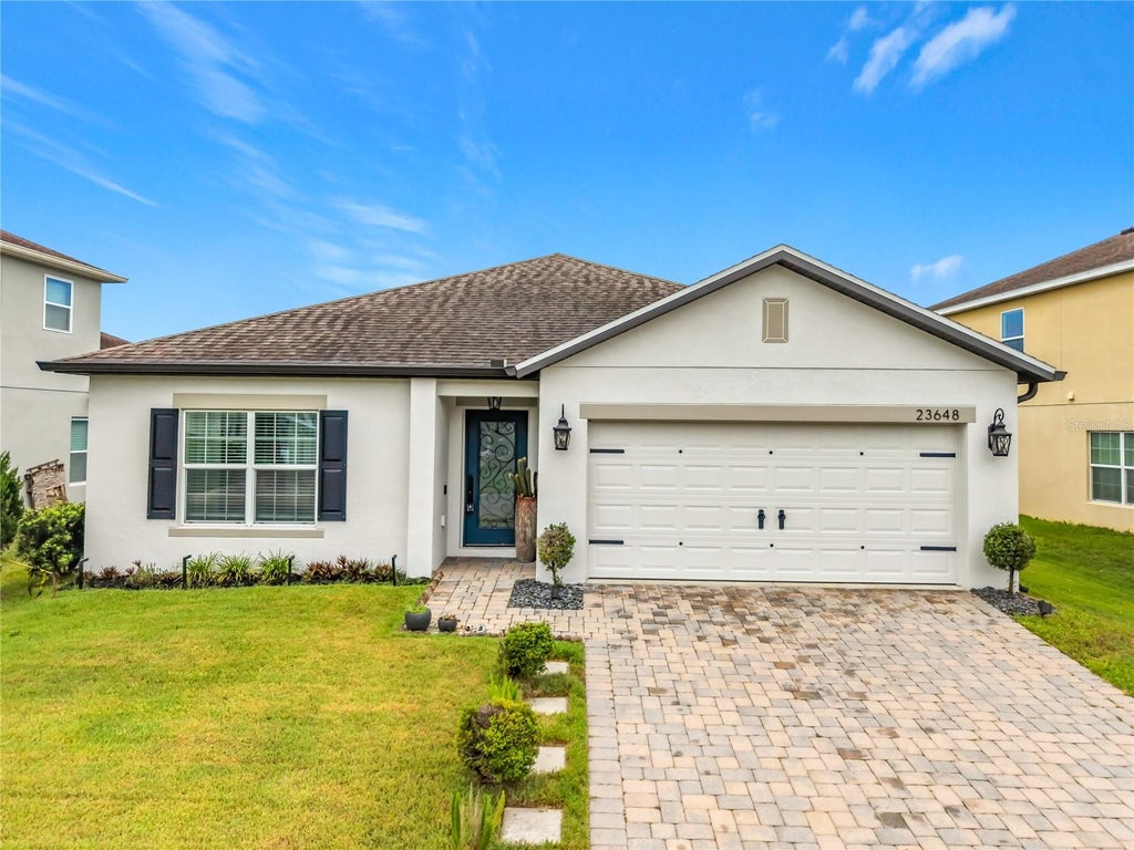 Photo of 23648 Companero Drive, Sorrento, FL 32776 (MLS # O6447286)