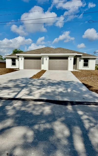 Under Construction. Welcome to a prime investment opportunity in Fort Myers, FL! This newly constructed duplex offers a savvy way to build generational wealth. Each unit features 3 bedrooms, 2 bathrooms, and a one-car attached garage, providing the perfect blend of comfort and practicality. You can enjoy the flexibility of living in one unit while renting out the other. The living space is beautifully designed with tile floors throughout, complemented by an open-concept kitchen that boasts granite countertops and a large island, perfect for entertaining. The luxurious feel of the home is elevated by a walk-in shower with floor-to-ceiling tile. Step outside to your private patio and large backyard, ideal for barbecues and gatherings. This property is conveniently located with easy access to State Route 82, making travel to Fort Myers a breeze. Whether you're an investor or a homeowner seeking rental income, this property is your ticket to paradise.