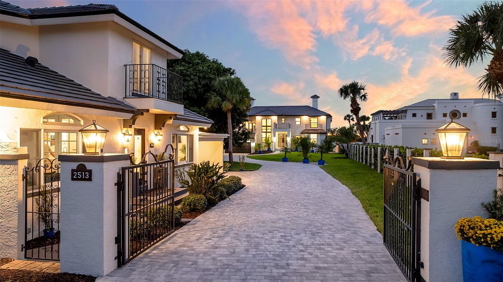 Newly Remodeled Waterfront Estate | 6 Beds | 5 Baths | Guest House | New Pool & Dock
Experience refined coastal luxury in this gated, totally redesigned waterfront estate offering breathtaking, unobstructed views of Blackburn Bay. The main residence features 4 bedrooms and 3 baths, complemented by a 2-bedroom, 2-bath guest house—fully turnkey and beautifully furnished, complete with full kitchen, laundry, and carport with workspace.
Every detail was thoughtfully curated throughout the redesign. The chef’s kitchen is a showpiece with Thermador premium appliances, 48-inch 6-burner range, custom range hood, two wine and beverage refrigerators, elegant banquette, and handmade tile backsplash.
Interior highlights include a soaring 20-foot stone fireplace wall, curved staircase with custom railings, and light oak flooring throughout. The home showcases handcrafted natural stone finishes—marble, dolomite, quartzite, and travertine—in every room.
Outdoors, enjoy resort-style living with a new 48-foot lap pool and spa, porcelain Tabby Oyster deck, lush landscaping, and a new 16,000-lb lift and dock with water, electric, and solar lighting—engineered for all tides and storms. Additional features include nine remote-controlled roll-down screens, a well-fed irrigation system, marine-grade exterior lighting, custom Kynar railings, and wood porch ceilings.
This extraordinary property blends timeless design, top-quality materials, and unmatched waterfront living—ideally located near the world-class dining, shopping, and culture of downtown Sarasota and the charming coastal town of Venice. The perfect spot to enjoy breathtaking sunsets over Casey Key.