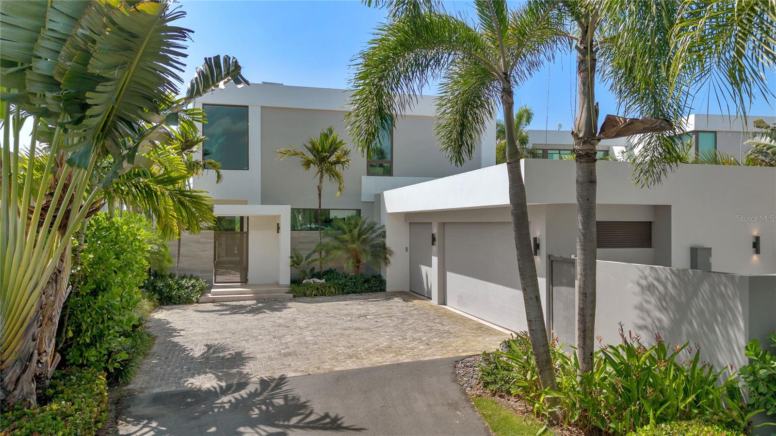 This recently upgraded, two-level single-family is located in The Enclave at Dorado Beach, an esteemed community known for its luxurious living and world-class amenities. The magnificent residence spans over 6,400 gross sq. ft. and features 5 bedrooms and 5.5 bathrooms, offering ample space and comfort for your family and guests. The home boasts numerous custom expansions and upgrades, including the addition of a fifth bedroom with a full bath, a gym, and a versatile flex room on the second floor. High-end features include a Pelican water filtration system, full-house Lutron electric shades, and premium Wolf, Sub-Zero, and Miele appliances, ensuring both convenience and elegance in everyday living. Situated in one of the best locations within The Enclave, this property offers breathtaking, unobstructed sunset and mountain views over the Sugarcane Golf Course. The serene and picturesque setting provides a perfect backdrop for relaxation and entertainment. Residents enjoy unparalleled access to a host of exclusive amenities, all just a short walk or a golf cart ride away. Indulge in the luxurious Encanto Beach Club, make a splash at the water park, savor gourmet dining at nearby restaurants, stay healthy at the well-equipped fitness center, and perfect your swing at the prestigious Golf Club. Experience the epitome of luxury living at The Enclave in Dorado Beach.