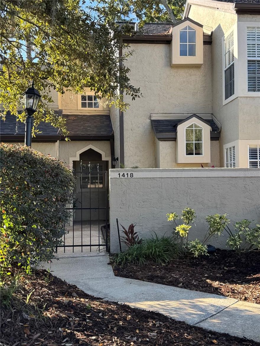 Elegant mediterranean & courtyard style gated community, Barclay Place at Heathrow, is ideally located north of Orlando in beautiful Lake Mary, Florida amid lush tropical & mature landscaping. Located on the peaceful west end of Lake Mary near the Seminole Wekiva Trail, yet just a few miles away form all the conveniences of shopping, dining, entertainment, and close enough to the interstate for easy access to the beaches east or west, or to all that Orlando has to offer to the south. This 2BR/2BA townhome style condo has 2 large master bedrooms with en-suite full bathrooms and walk-in closets. Very open floor plan perfect for functional flow and entertaining. Soaring ceilings, wood burning fireplace, French doors to a cozy screened-in lanai all make this a place you'll want to come home to. Courtyard style entrance offers extra outdoor space to enjoy the beautiful Florida sunshine for yourself or for your plants & gardening hobbies. Community amenities include sparkling pool, recreational center & clubhouse, and tennis courts. Or enjoy the miles and miles of Seminole Wekiva Trails for biking/hiking/walking that is just a short walk from this community. And if that isn't enough to keep you entertained and busy, you can join The Athletic Club of Heathrow and the Heathrow Golf Course and Country Club that are right next door. This lovely Condo community has so much to offer and it's all ready & waiting for you to claim as your own. Call listing agent for easy showing.