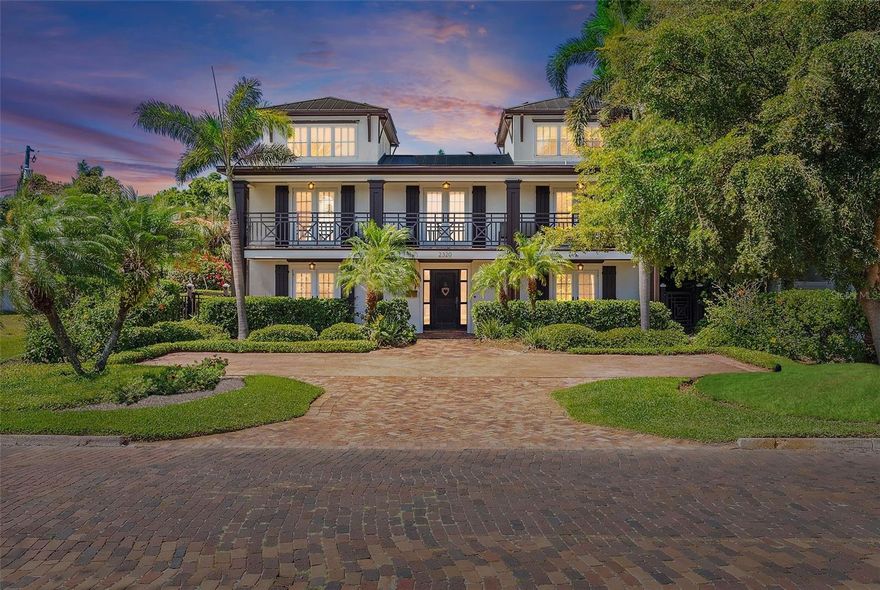 This architecturally distinctive energy-efficient home sits on prime waterfront property with a water lot and dock on Coffee Pot Bayou. THIS IS THE OPPORTUNITY YOU HAVE BEEN WAITING FOR! This 4-bedroom, 3.5 Bath pool home with an oversized 2-car garage (alley access) Is located in COFFEE POT BAYOU which is one of the oldest neighborhoods in St Petersburg. This upscale residential neighborhood is known for being one of the most coveted premium living communities in Tampa Bay. It is walkable to vibrant downtown St Petersburg and all the nearby parks. Enjoy expansive views of the Bayou from your multiple front porches and have dolphin and manatee sightings be part of your everyday life. Deeded private water dock across the street with a 12k lift, electric, and water. This home has been professionally remediated on the main level and the second level with all 4 oversized bedrooms and 3 full bathrooms is completely in-tact ready to go. With the option of 2 private and luxurious master suites with their own finely detailed bathrooms and access to a front balcony overlooking the sparkling waterfront. Current primary with vaulted ceilings, a walk-around en-suite bathroom with picture-perfect soaking tub, walk-in shower, and massive custom closet. The second option for a primary features a large room with a second-level loft, an en-suite stunning custom bathroom with dual vanities, and a walk-in shower. Up a few short steps, you will find a private wing with 2 additional bedrooms, a full beautiful bathroom, and a great room featuring a wet bar area and a full-size subzero wine/beverage cooler. Ideal for guests or kids. Let your imagination guide you in restoring the main level which has been professionally remediated and waiting to be put back to its glory. Large sprawling rooms flow from one to the next yet separate and distinct. A formal entry, large living room with fireplace, dining room, large kitchen, private office/den/media room. Powder bathroom and utility room. A bright and glorious living room with vaulted white ceilings leading out to the Pebbletec pool is surrounded by imported handmade brick pavers.  Outside features: vintage stucco, long-lasting metal roof and pergolas. Solar panels, impact windows, and composite exterior shutters look like real wood for durability and low maintenance.